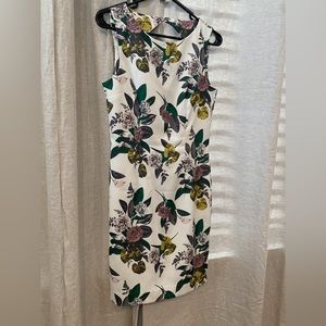 Ivory floral satin fitted dress with beaded detail. Size 6